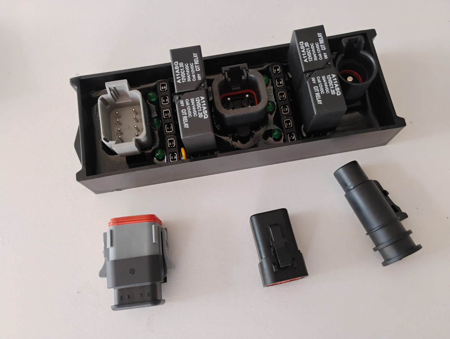 Motorsports EFI relay module including connectors